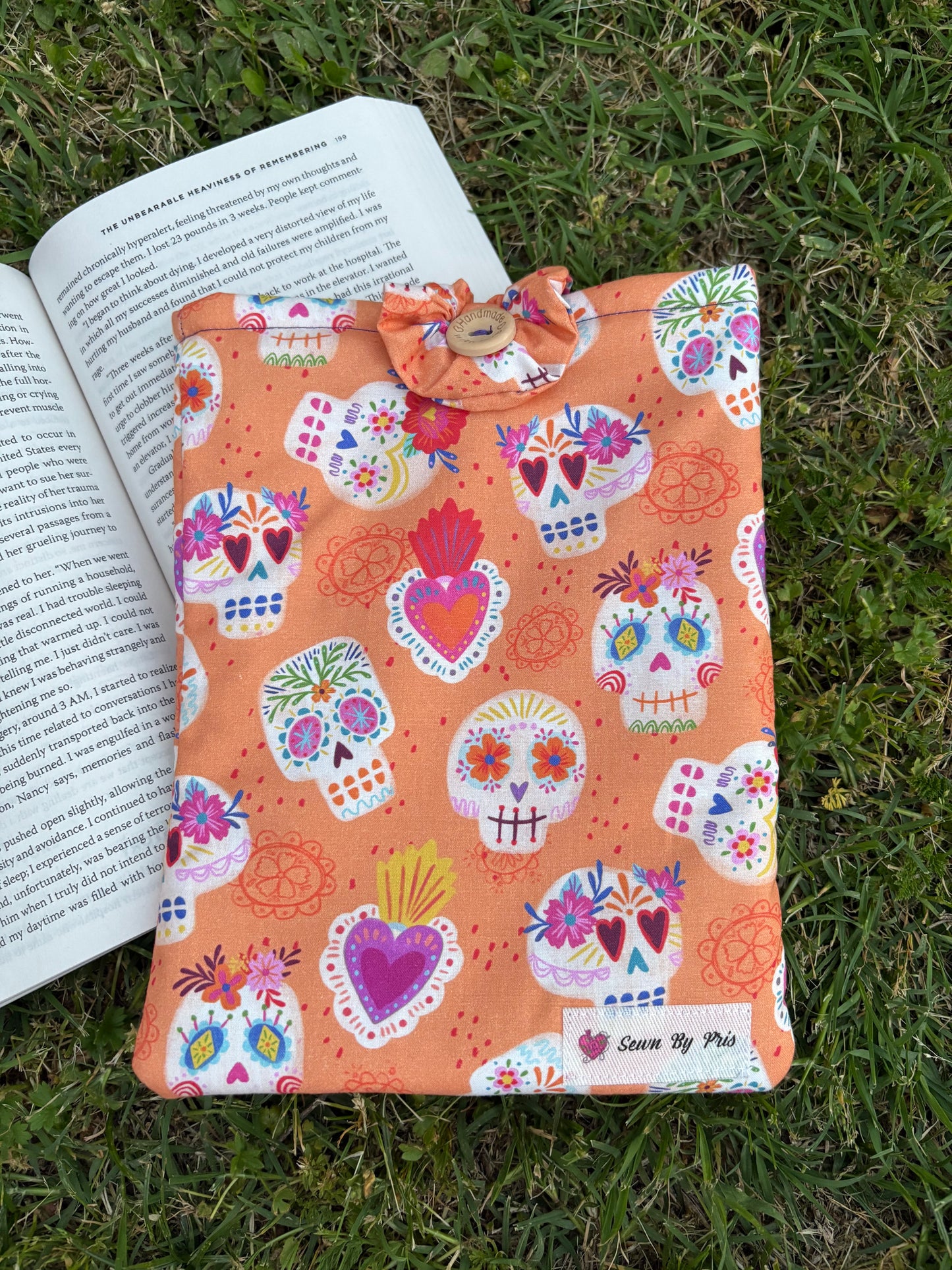 Orange Calaveras Paperback Sleeve