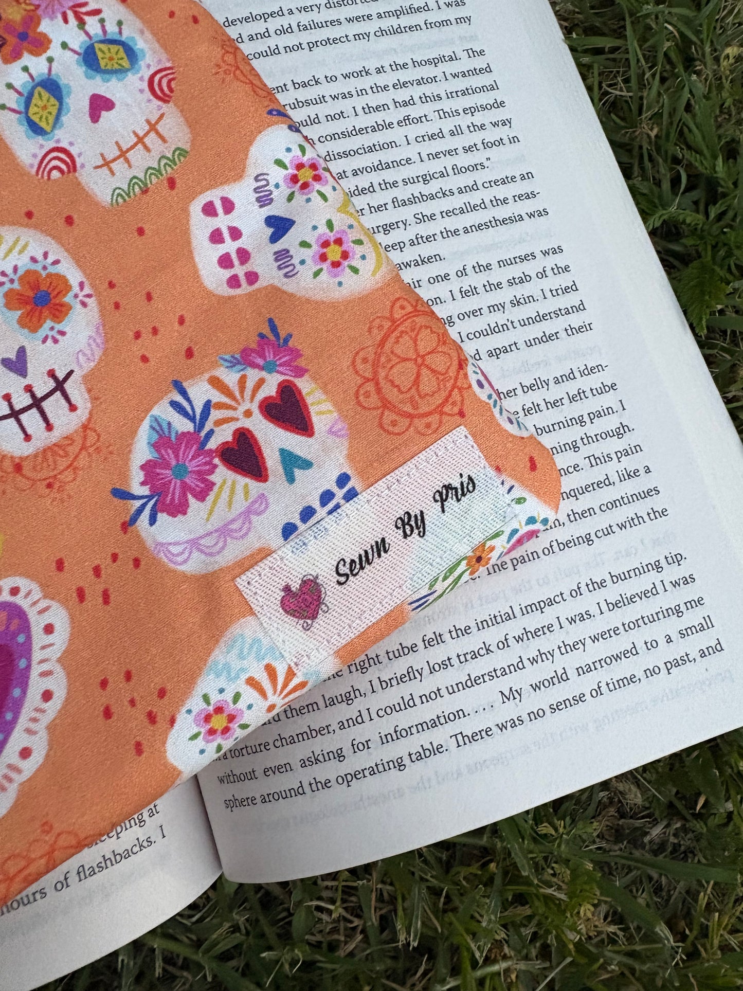 Orange Calaveras Paperback Sleeve