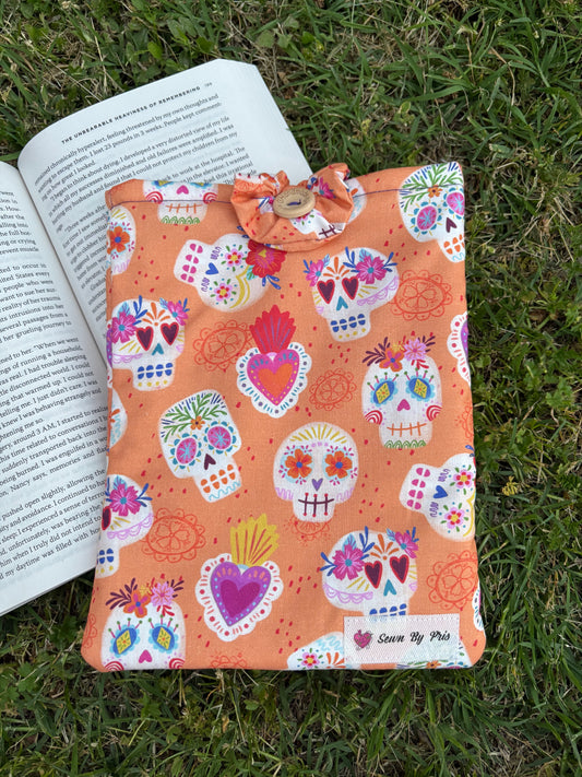 Orange Calaveras Paperback Sleeve